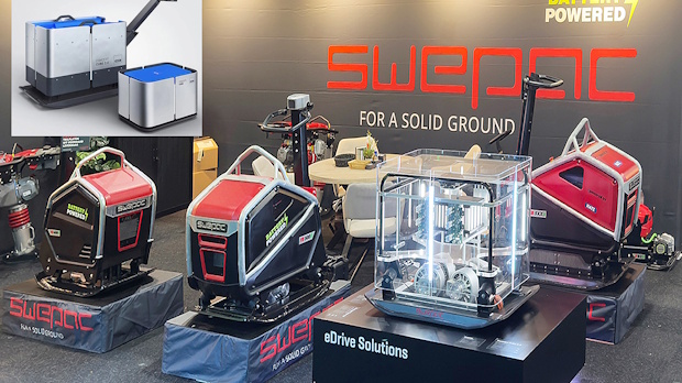 Exhibition booth featuring three red/black portable power units on pedestals, with a clear protective case on the center unit and prominent SWEPAC branding in the background.