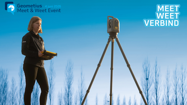 Woman in a black jacket uses a handheld controller beside a tripod surveying instrument at the Geometius Meet & Weet Event.